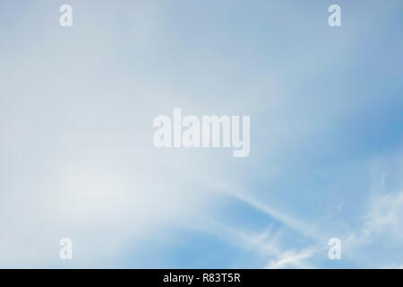 blue sky with white soft clouds, blurry image Stock Photo