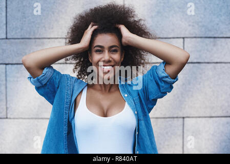 Young woman in jeans jacket free style on the street isolated on Stock Photo