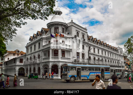 One of Sri Lanka's iconic historic hotels, Queen's Hotel, situated in the heart of Kandy, faces the beautiful splendid surroundings alongside the Kand Stock Photo
