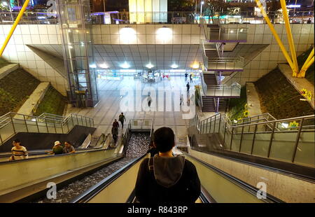 KAOHSIUNG, TAIWAN -- DECEMBER 1, 2018: The exit and entry of the modern Central Park Station of the Kaohsiung Mass Rapid Transit system. Stock Photo