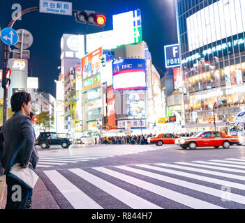 Pedestrian at traffic light on Shibuya Street. Shibuya