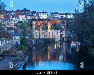 Railway viaduct over the River Nidd at dusk in Knaresborough North Yorkshire England Stock Photo