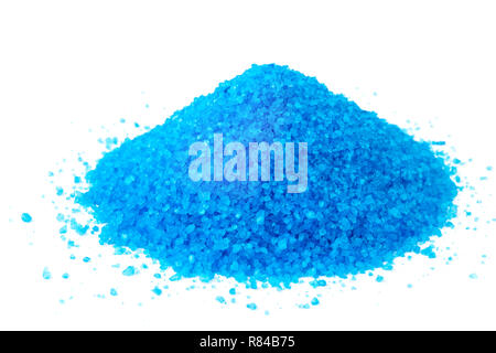 Small pile of blue bath salts on the white background Stock Photo