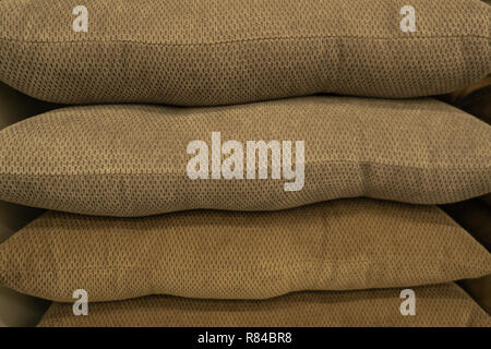 Multicolored cushions or pillows on display in store Stock Photo