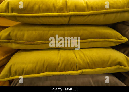 Multicolored cushions or pillows on display in store Stock Photo
