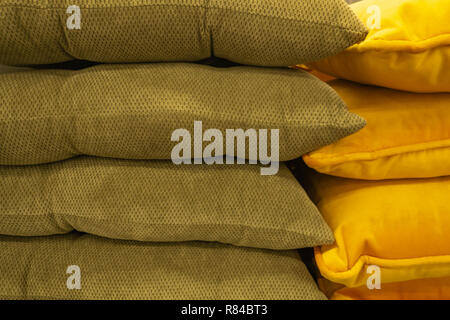 Multicolored cushions or pillows on display in store Stock Photo
