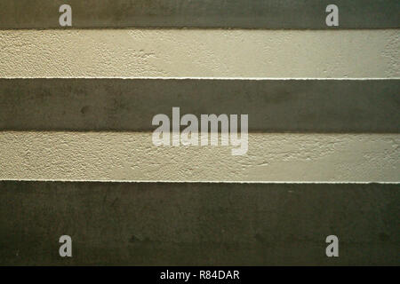 white Structural plaster on black wall Stock Photo