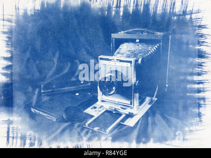 Old large format camera and cassettes for it. Cyanotype scan on watercolor paper. Attention! The image has the texture of watercolor paper! Stock Photo