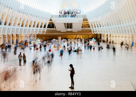 New York City, USA - June 24, 2018: Interior view of World Trade Center Transportation Hub or Oculus designed by Santiago Calatrava architect. Long ex Stock Photo