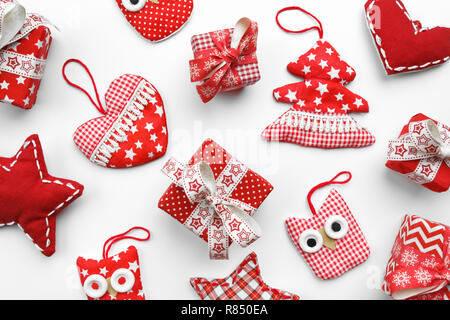 Flat lay. Christmas, gifts, Christmas boxes and Christmas toys on a white table Stock Photo