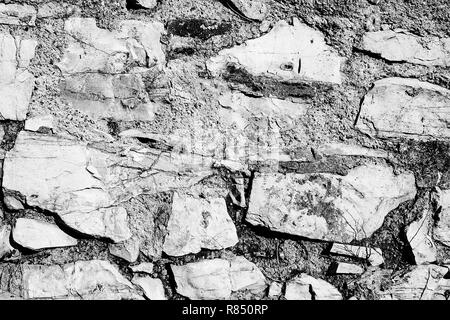 Rock bricks patterned laying Black And White Textured Stock Photo