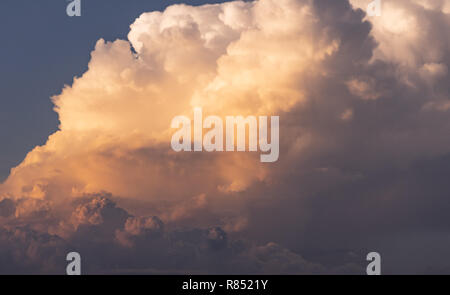 close up soft focus dramatic twilight sunset fluffy cloud on blue sky Stock Photo