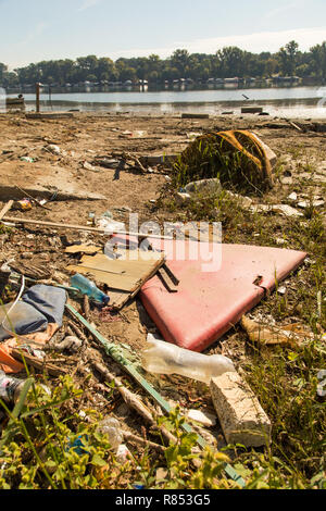 Polluted river bank by some random trash making huge ecological problem in Serbia Stock Photo