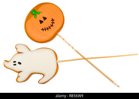 Halloween two gingerbread pumpkin and ghost isolated on white. Stock Photo