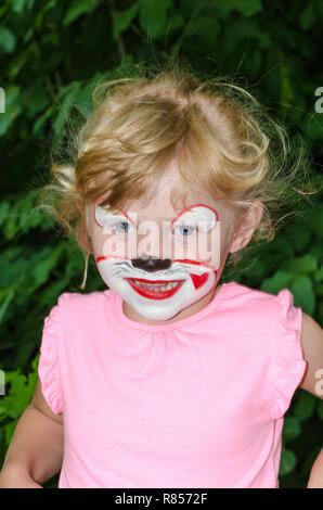 blond girl with face painting Stock Photo