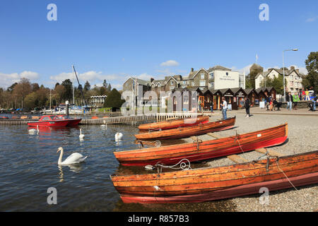 Wooden rowing boats for hire on Windermere lakeside in the Lake District National Park. Bowness on Wndermere, Cumbria, England, UK, Britain Stock Photo