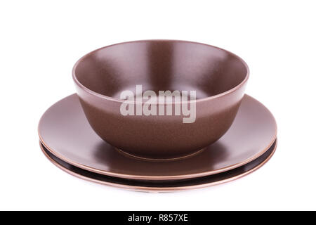 Bowl and plates isolated on white background. Stock Photo