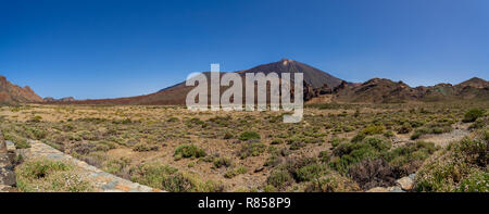 Panoramic view of the lava fields of Las Canadas caldera of Teide volcano. Tenerife. Canary Islands. Spain. View from the observation deck - 'Mirador  Stock Photo