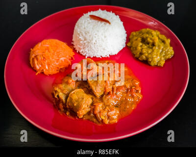 Rougail saucisse, emblematic dish of Reunion island, France Stock Photo