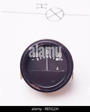 Old car ammeter on a background of the electric scheme Stock Photo