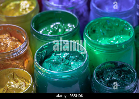 colorful plastisol ink in transparent bottles in screen printing tee shirt  factory store Stock Photo - Alamy