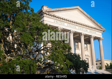 Scenic afternoon view of the neoclassical United States Custom House building with greenery in Charleston, South Carolina, USA Stock Photo