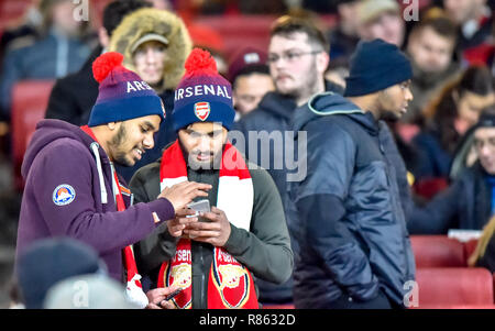 London, UK. 13th December, 2018. Arsenal supporters before the UEFA Europa League group stage match between Arsenal and Qarabag FK at the Emirates Stadium, London, England on 13 December 2018. Photo by Phil Hutchinson.  Editorial use only, license required for commercial use. No use in betting, games or a single club/league/player publications. Credit: UK Sports Pics Ltd/Alamy Live News Stock Photo