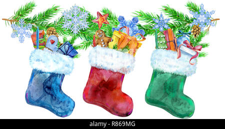 Christmas colorfull socks with gifts and spruce branches isolated on white background. Watercolor hand drawn illustration Stock Photo