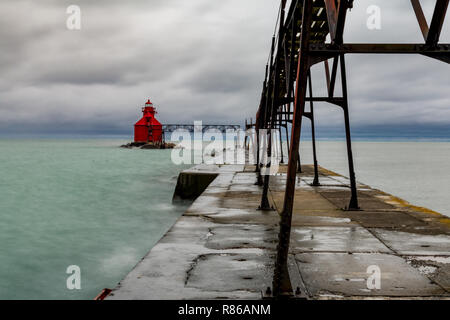 Stormy skies on a cold fall/autumn day looking out at the pier head lighthouse, Sturgeon Bay, Door County, Wisconsin. Stock Photo