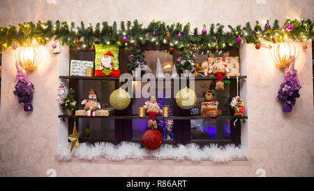 vintage decorative shelf with Christmas decorations on the wall ...