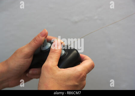 Remote control that communicates by wireless with the car checking Stock Photo