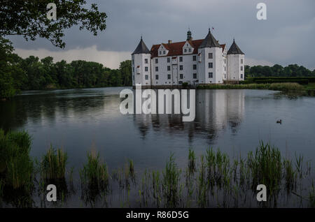 Glücksburg Castle is a water castle in the town of Glücksburg, Germany. It is one of the most important Renaissance castles in northern Europe. Stock Photo