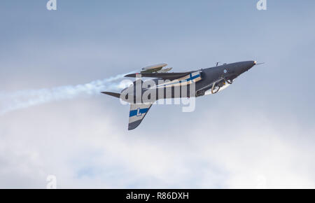 BAE Systems Hawk Mk 51A advanced trainer of the Finnish Air Force flying inverted at the Tikkakoski Air Show of 2018. Stock Photo