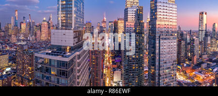 Aerial view of New York City skyscrapers at dusk Stock Photo