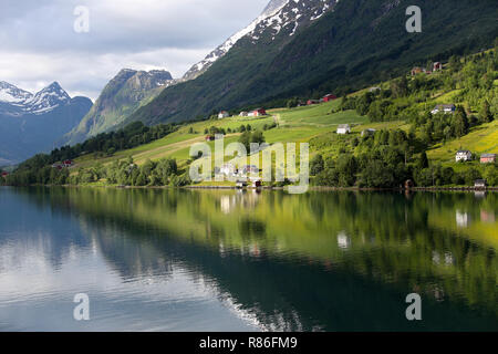 Norway, Olden, landscape view of residential area in fjord. Stock Photo