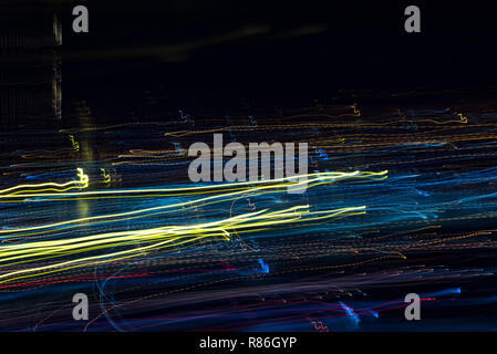 Bright abstract stripes patterns from light strips on a black background Stock Photo