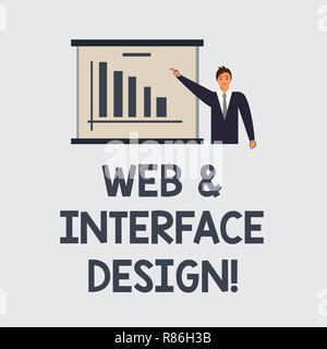 Text sign showing Web And Interface Design. Conceptual photo Website designers online sites developing Man in Business Suit Standing Pointing a Board  Stock Photo