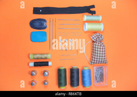 Group of objects related to sewing ordered and viewed from above type flat lay Stock Photo