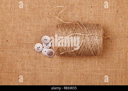 Ball of yarn burlap background Stock Photo