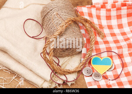 Ball of yarn burlap background Stock Photo