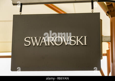 SEATTLE, WA, USA - JUNE 2018: Close up view of a sign outside the Swarovski factory store at the Premium Outlets shopping mall in Tulalip near Seattle Stock Photo