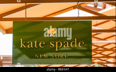 SEATTLE, WA, USA - JUNE 2018: Close up view of a sign outside the Katie Spade New York factory store at the Premium Outlets shopping mall in Tulalip n Stock Photo
