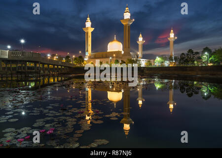 Morning sunrise sky of Masjid Bukit Jelutong in Shah Alam near Kuala lumpur, Malaysia. Also known as Mosque of Tengku Ampuan Rahimah. Stock Photo