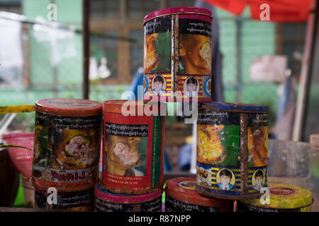 Cans of tobacco with stern warnings in Yangon, Myanmar. Stock Photo