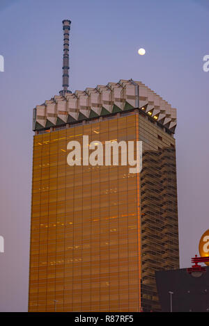 Tokyo Skytree covered by Asahi Beer Hall just like a old school cell phone. Stock Photo