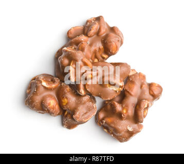 Peanuts covered chocolate isolated on white background. Tasty sweet chocolate truffles. Stock Photo