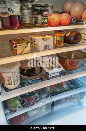 Inside view of a fridge and Contents owned by a 90 year old lady in England Stock Photo