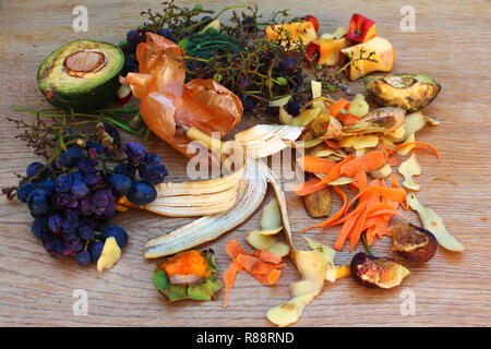 Domestic waste for compost from fruits and vegetables on the table. Stock Photo