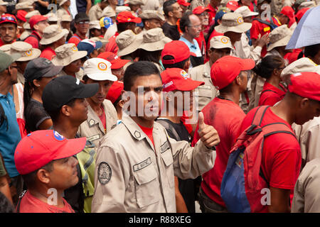 Military and civilians marching together in city, Caracas, Venezuela, South America Stock Photo