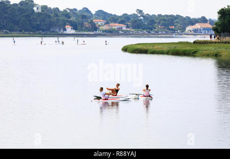 SUP Yoga, Hossegor, France Stock Photo